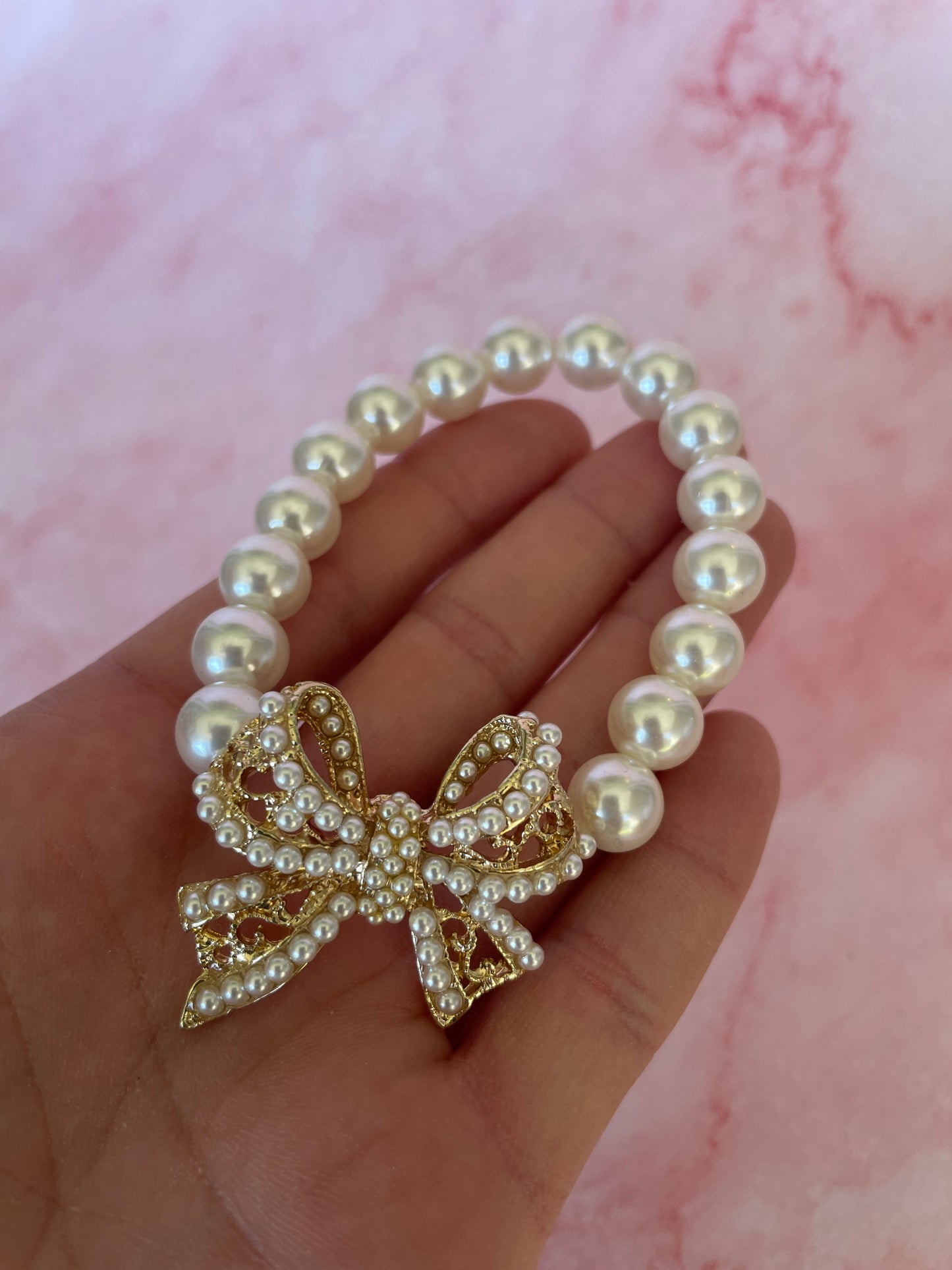 Gold Bow and Pearl Bracelet