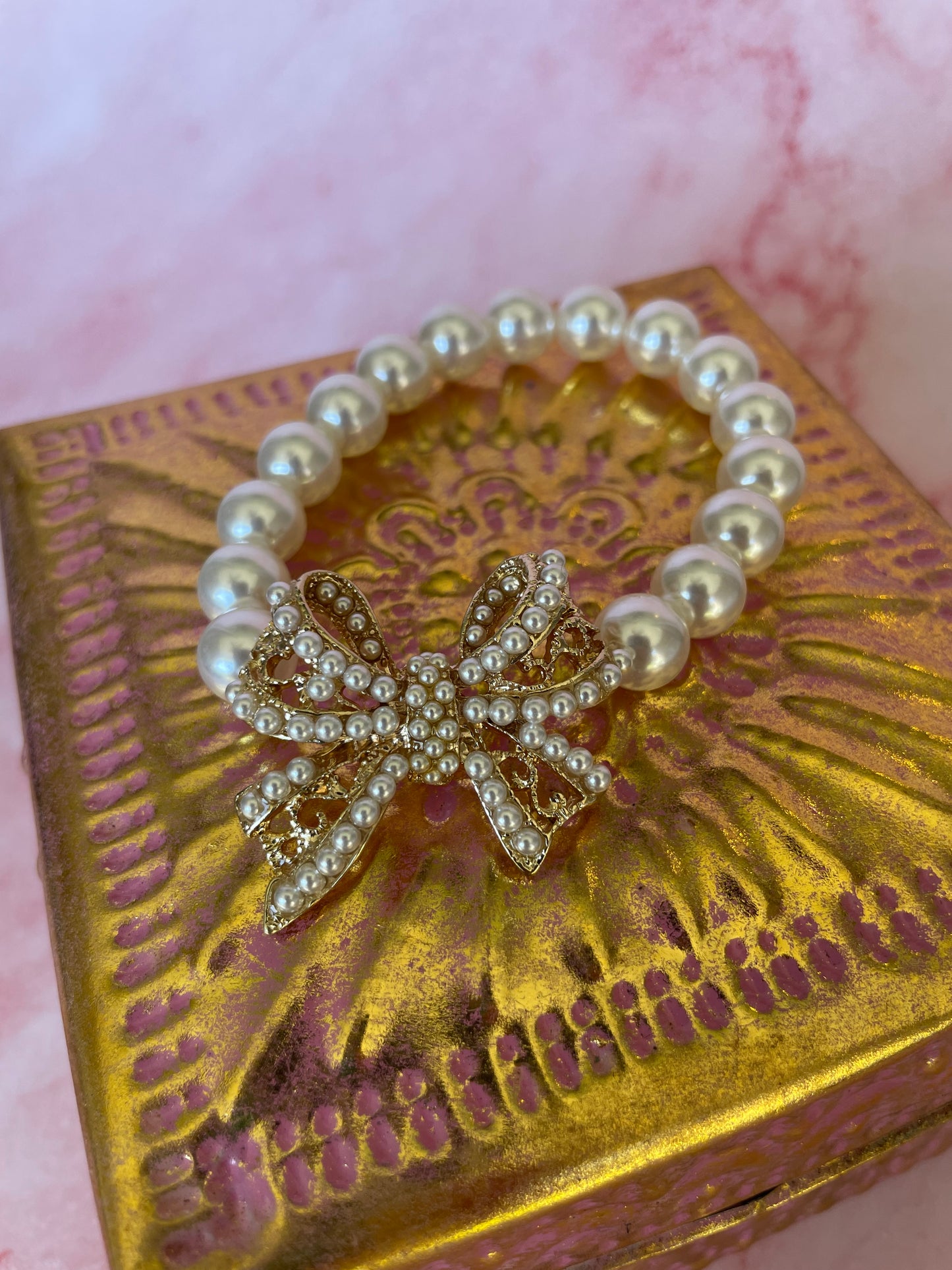 Gold Bow and Pearl Bracelet