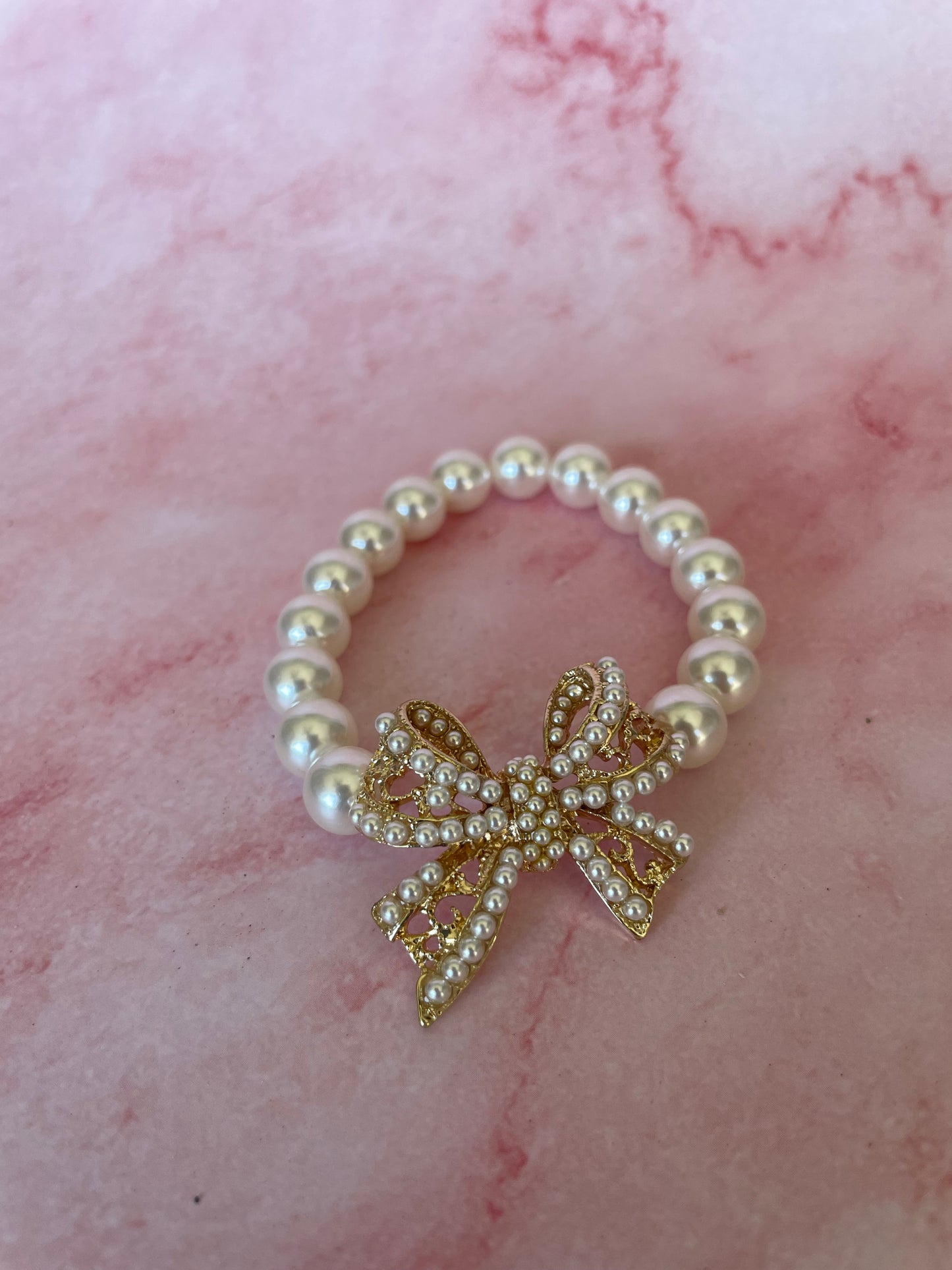 Gold Bow and Pearl Bracelet