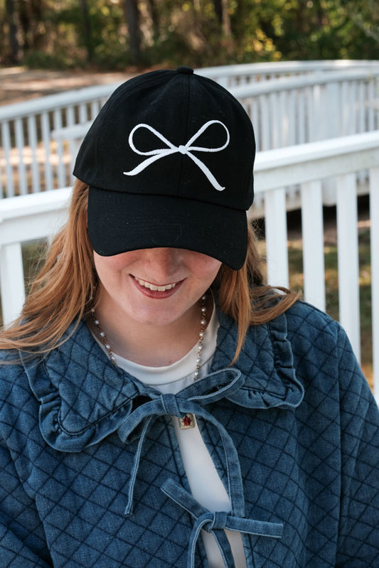 White Embroidered Coquette Bow on a Black Baseball Cap