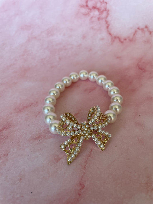 Gold Bow and Pearl Bracelet